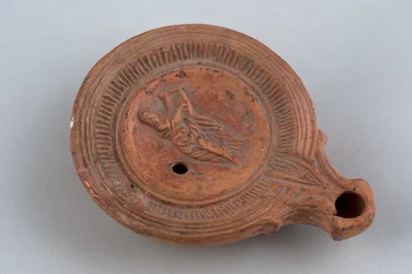 Lampe mit Figur, die die Leier spielt